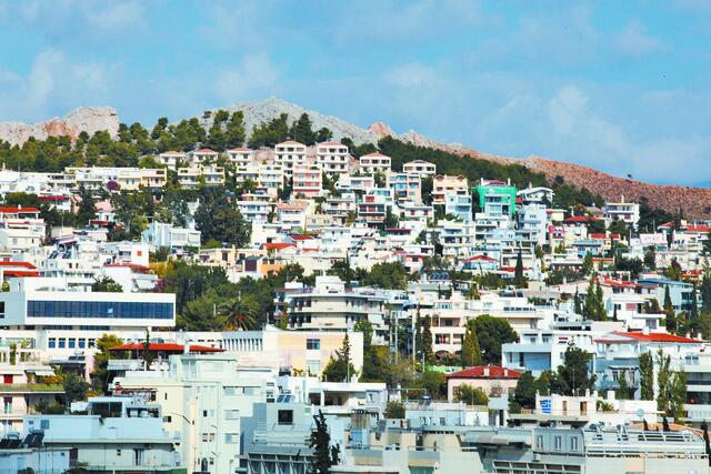 Αθηναϊκή πολυκατοικία λόφος