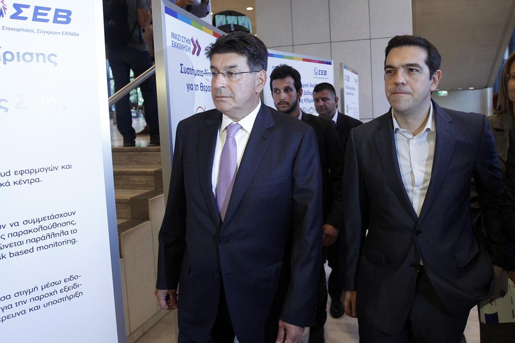 Greek industrialists warn over state handouts, plans to hike minimum wage