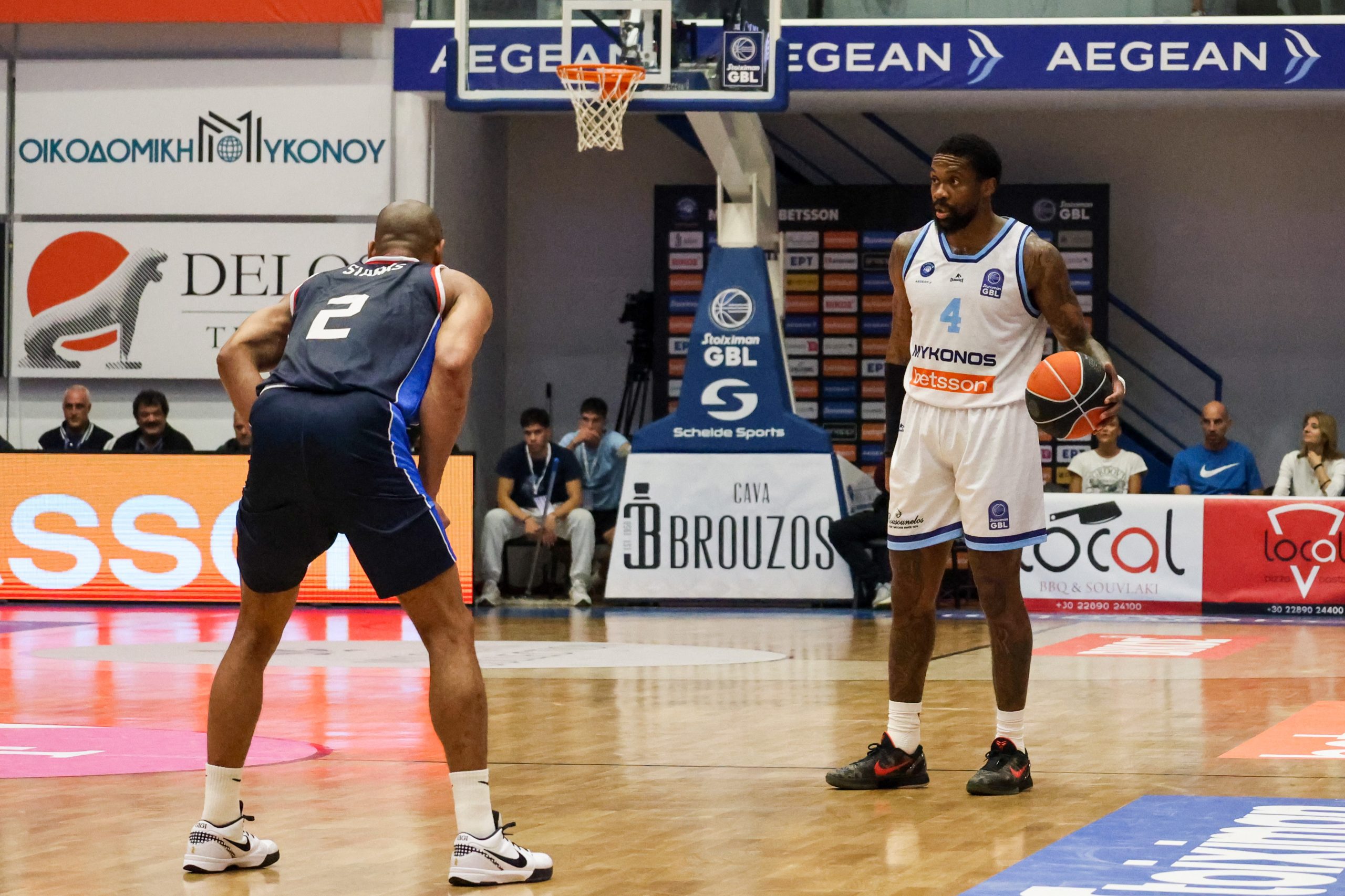 &Mu;ύ&kappa;&omicron;&nu;&omicron;&sigmaf;-&Pi;&alpha;&nu;&iota;ώ&nu;&iota;&omicron;&sigmaf; 86-77: &Tau;&omicron; &laquo;&pi;ή&rho;&epsilon; &pi;ά&nu;&omega; &tau;&omicron;&upsilon;&raquo; &omicron; &Gamma;&kappa;&rho;έ&iota; &mu;&epsilon; 27 &pi;ό&nu;&tau;&omicron;&upsilon;&sigmaf;, &delta;ί&chi;&omega;&sigmaf; &nu;ί&kappa;&eta; &omicron;&iota; &laquo;&kappa;&upsilon;&alpha;&nu;έ&rho;&upsilon;&theta;&rho;&omicron;&iota;&raquo;